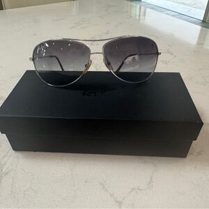 Ray-Ban Silver Aviator with dark grey lenses.
